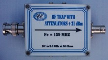 [Photograph of RF Trap with attenuators showing connectors]